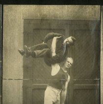 Strong Man Holding J.J. Stewart