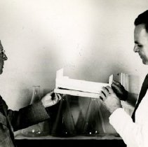 George M. Laughlin & J. Stedman Denslow examining tool