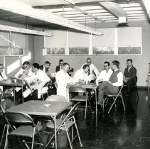 Irvin M. Korr with other KCOS staff members ca. early 1950s