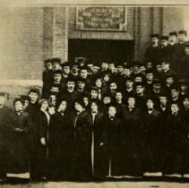 ASO Class of 1913 Jan outside church in caps & gowns