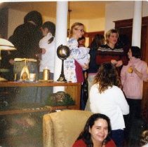 Maggie Starley Explaining White Elephant Gift Exchange