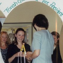 Toviah Cain Lighting Candle at SAA Installation Dinner