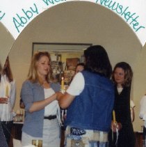 Abby Welker Lighting Candle at SAA Installation Dinner