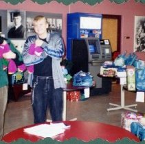 Matt Oswin and Johnny Mayus Preparing Gifts for Needy Families