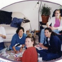 Group of SAA Members Decorating Cans