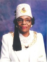 Portrait of Lucille Sayers wearing masonic fez and chain collar