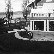 Wilson Jewett standing near the newly completed family home in Gardiner, OR