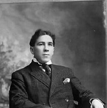 Unidentified young man in studio chair