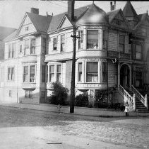 Narcissa Jewett standing on corner inf front of W.F. Jewett home in San Fra