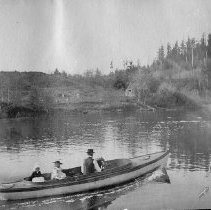W.F. Jewett and children in motor launch on Umpqua River