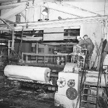 Operating lathe in plywood mill