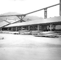 Lumber stacked in yard