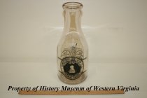 Glass milk bottle; one quart.