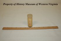 Comemorative glass vial.