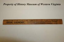 Wooden 12 inch ruler promoting "Ideal Laundry" service.