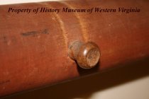 One of the Knobs for Holding Ropes on the Bed