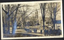 Crowd with clocktower in back