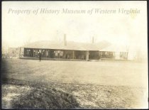 Man in front of building