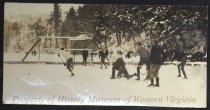 Young men playing ice hockey