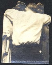 Backs of three people