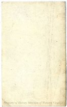 Man in front of Charlie's Shanty, back