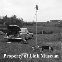 Dog Sniffing At Recording Equipment