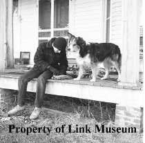 Corky On Porch Of B. F. Pope's House Wrapping Cords