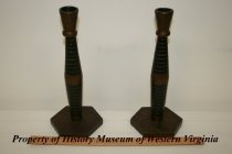 Close-up photo of Brass Candle Holders.