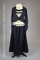 1916 navy wool suit with a white vest and slats