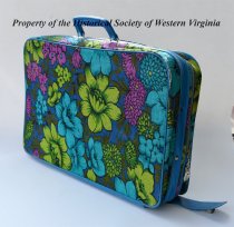 Blue and green floural suitcase