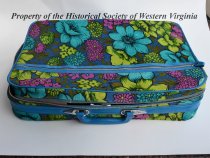 Blue and green floural suitcase