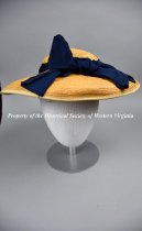 Wide brim straw hat with navy blue bow