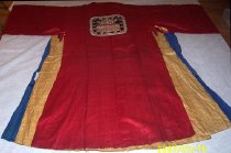 Red robe with dark blue flag (back)