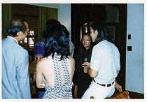 Laura Chan (second from the right) talking with a group of people