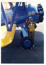 Maggie Gee in a flight uniform