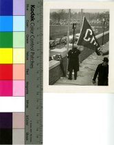 Man Raising Flag at University of Michigan Stadium