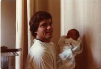 Michael Kelly with newborn son Ian in hospital