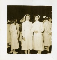 Jackline Myers with unidentified woman in white dental hygiene uniforms