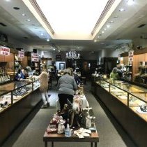 Staff Preparing For A Sale