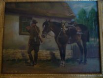 Ulan z koniem pod okienkiem