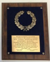 Wooden Plaque given to Congressman Rostenkowski by the PNA.