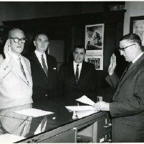 Anthony A. Scarpino (far left) is sworn in as Deputy Commissioner of Public Safety as Mayor P. Raymond Sirignano (second from left) and Commissioner T.E. Denton (second from left) look on.