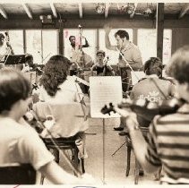 Aaron Copland Music and Arts Camp - Music Director Victor Lionti with orchestra