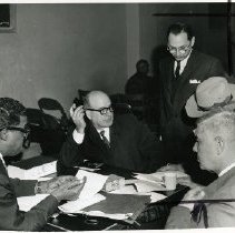 James Mazzares (second from left, suspect from Yonkers in bookmaking ring, being questioned at the County Jail, March 26, 1962.