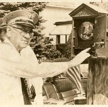 George Olsen starts parade at fire alarm box, 150th anniversary of Cortlandt Hook & Ladder Company