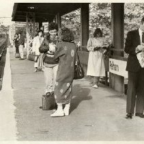 Commuters waiting for train at Pelham station