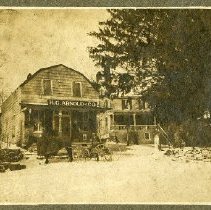 H.G. Arnold & Co. with horse and carriage outside