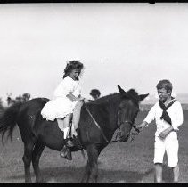 Columbus O' Donnell Iselin and Marie Iselin LaFarge on a horse