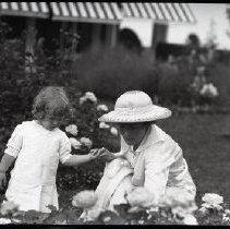Members of the Iselin family in a garden