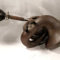 Double twist brass Rubes automotive horn (for Ford?)